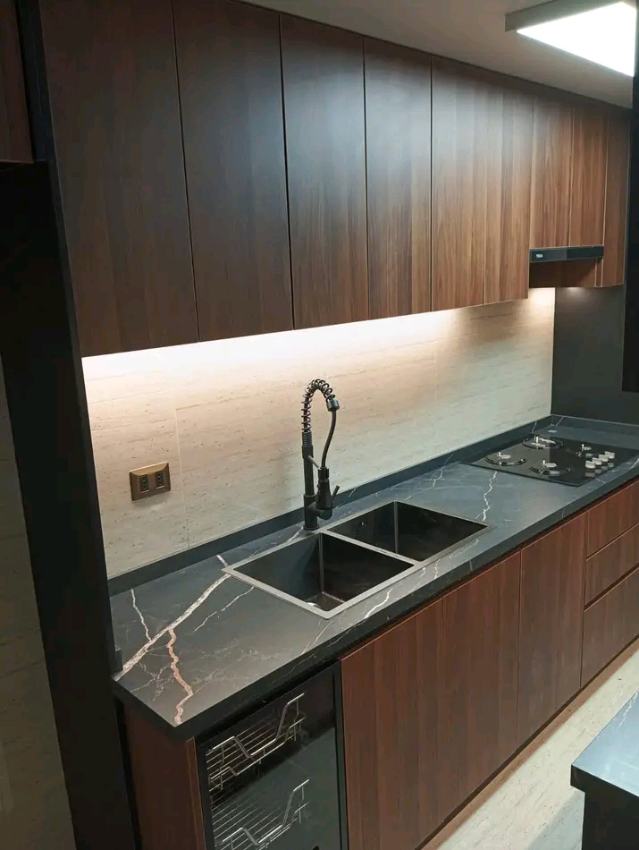 Cocina de concepto moderno minimalista en Las Condes